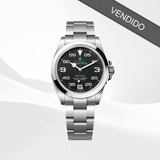 Reloj Rolex Air King de acero con esfera negra y brazalete metálico, números arábigos.