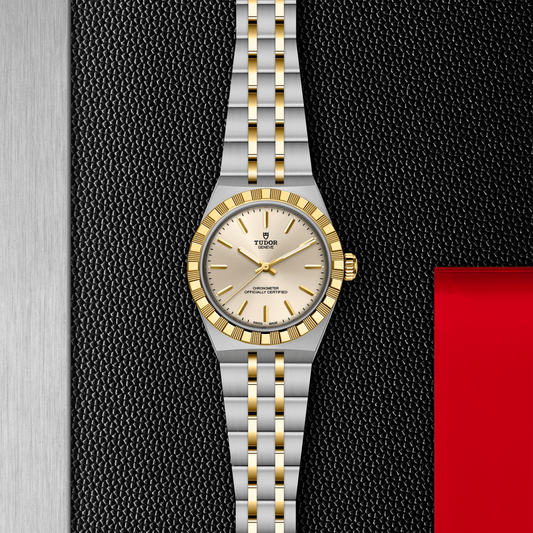Reloj TUDOR bicolor de acero, brazalete metálico y esfera crema con marcadores dorados