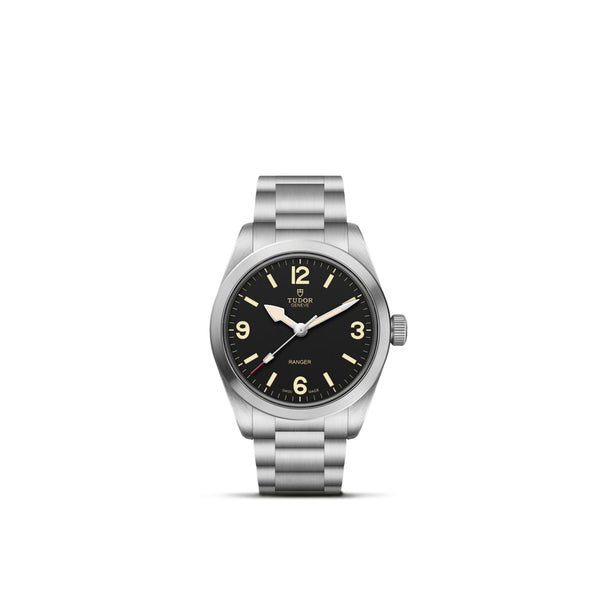 Reloj TUDOR Ranger con brazalete de acero y esfera negra con números luminosos.